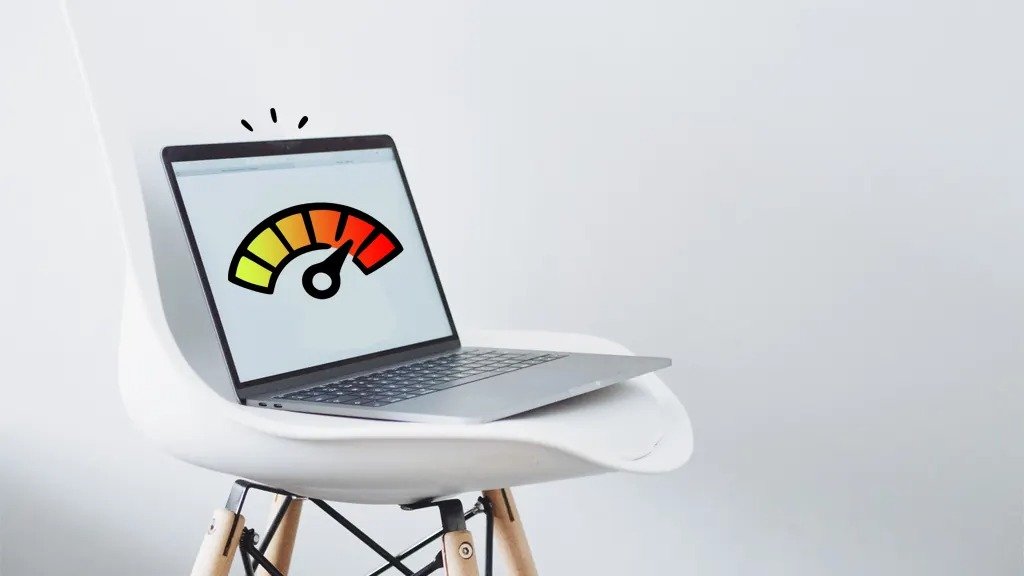 A laptop screen displaying a high-temperature warning symbol, indicating overheating.